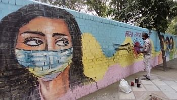 <div class="paragraphs"><p>A wall painted on the theme of Corona awareness, urging people to wear masks and keep themselves safe from COVID-19.</p></div>