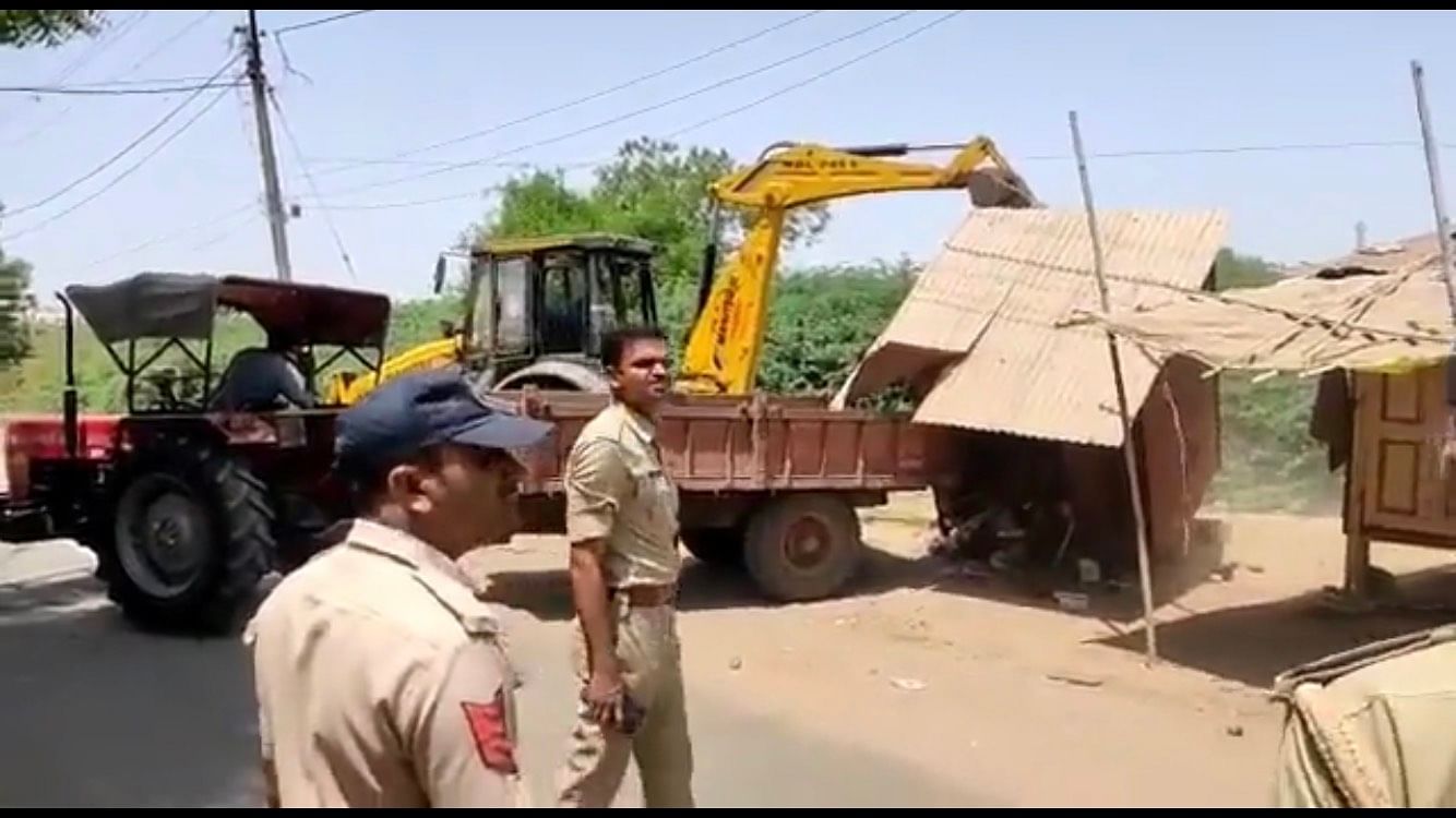 <div class="paragraphs"><p>Shops being demolished in Gujarat's Khambhat on Friday, 15 April, days after communal clashes erupted in the city on the occasion of Ram Navami.&nbsp;</p></div>