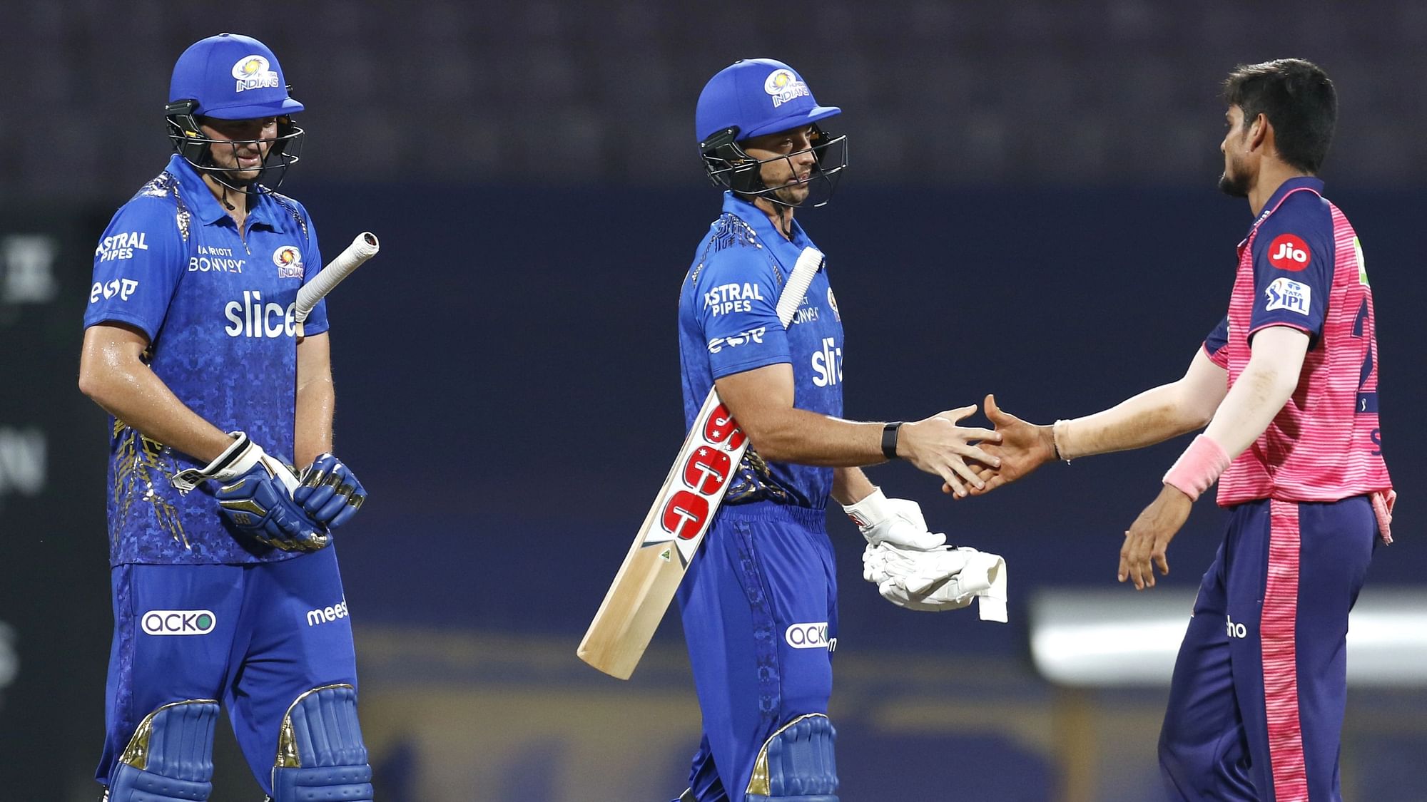 <div class="paragraphs"><p>Tim David and Daniel Sams shake hands with Kuldeep Sen after Mumbai Indians register their first win of IPL 2022.&nbsp;</p></div>