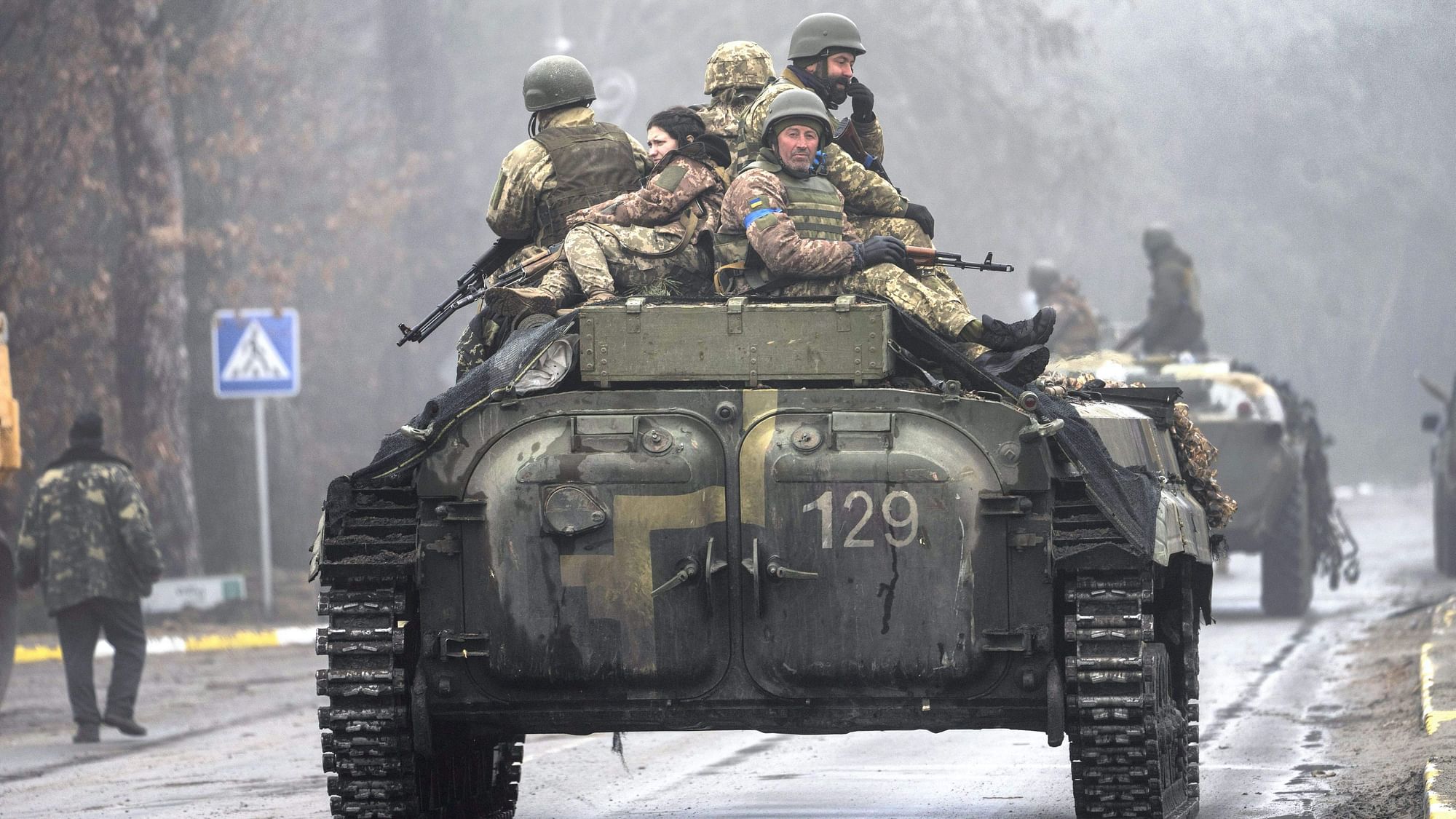 <div class="paragraphs"><p>Ukrainian army soldiers take part in a military sweep to search for possible remnants of Russian troops after their withdrawal from villages in the outskirts of Kyiv, Ukraine, Friday, April 1, 2022. </p></div>