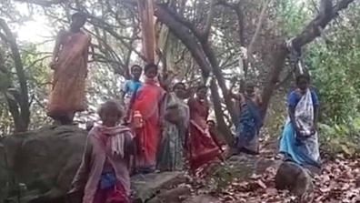 <div class="paragraphs"><p>With 'nooses' around their necks, a few tribal women farmers in Andhra Pradesh's Anakapalli district on Friday, 8 April, staged a protest against purported plans to hand over their cashew plantations to a mining company.</p></div>