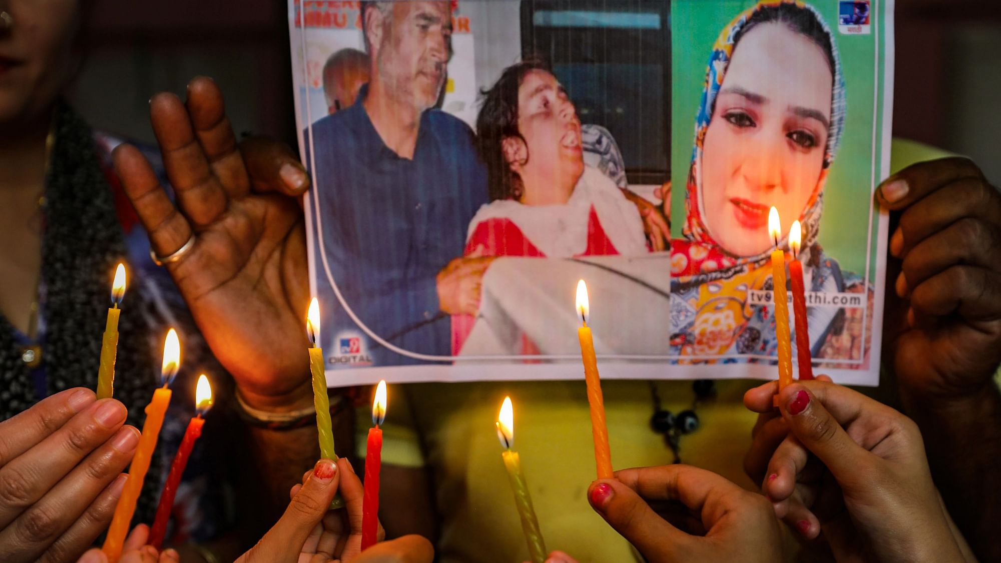 <div class="paragraphs"><p>Jammu: Students of a dance institute light candles to pay tribute to TV artist Amreen Bhat, in Jammu, Thursday, 26 May. Bhat was shot dead by militants at her home in Budgams Chadoora on Wednesday.</p></div>