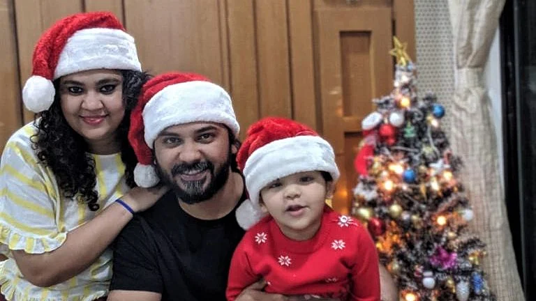 <div class="paragraphs"><p>Kapil and Pooja with their 4-year-old son</p></div>