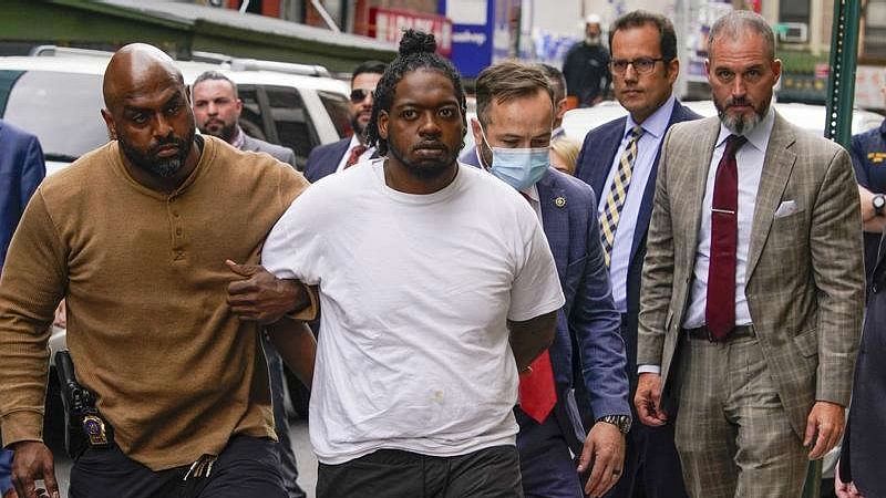 <div class="paragraphs"><p>Andrew Abdullah (25) was arrested at his lawyer’s office for killing Brooklyn resident Daniel Enriquez (48), who was shot in the chest during his commute on Manhattan’s Q Train on Sunday morning.</p></div>