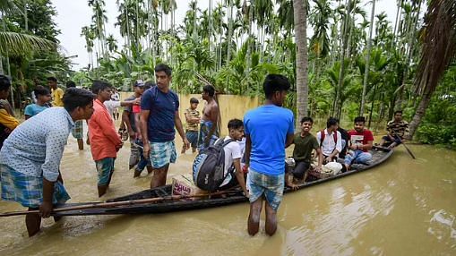 <div class="paragraphs"><p>At least five people have died as floods continue to affect around 2 lakh people in 20 districts of Assam, PTI reported on Tuesday, 17 May.</p></div>