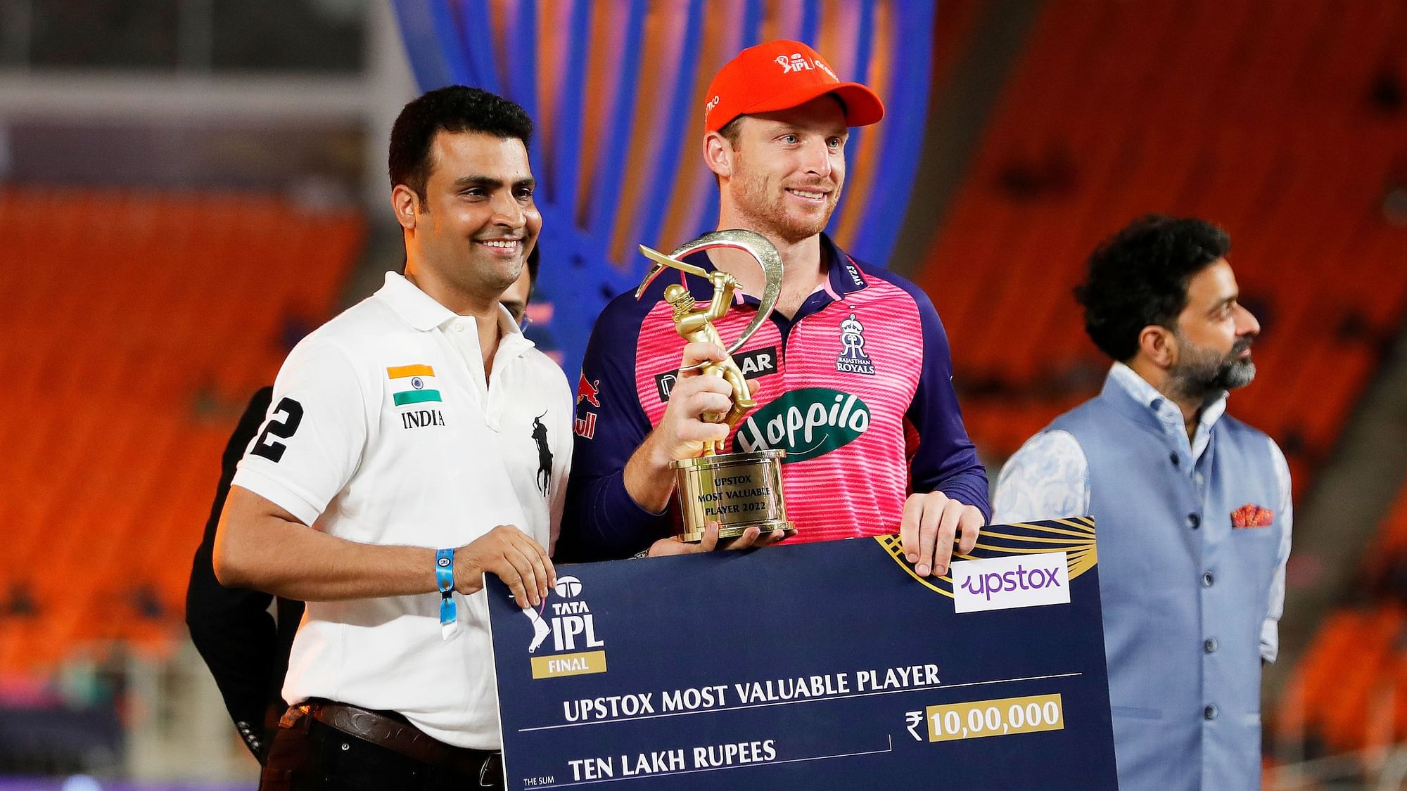 <div class="paragraphs"><p>Jos Buttler collecting one of the many awards he won after the IPL 2022 final.&nbsp;</p></div>