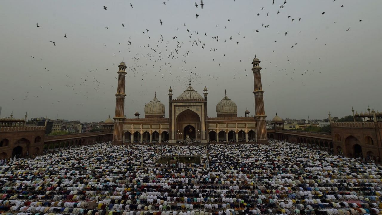 <div class="paragraphs"><p>New Delhi: Muslims offer prayers at the Jama Masjid on the occasion of Eid-ul-Fitr, in old Delhi on Tuesday, 3 May.</p></div>
