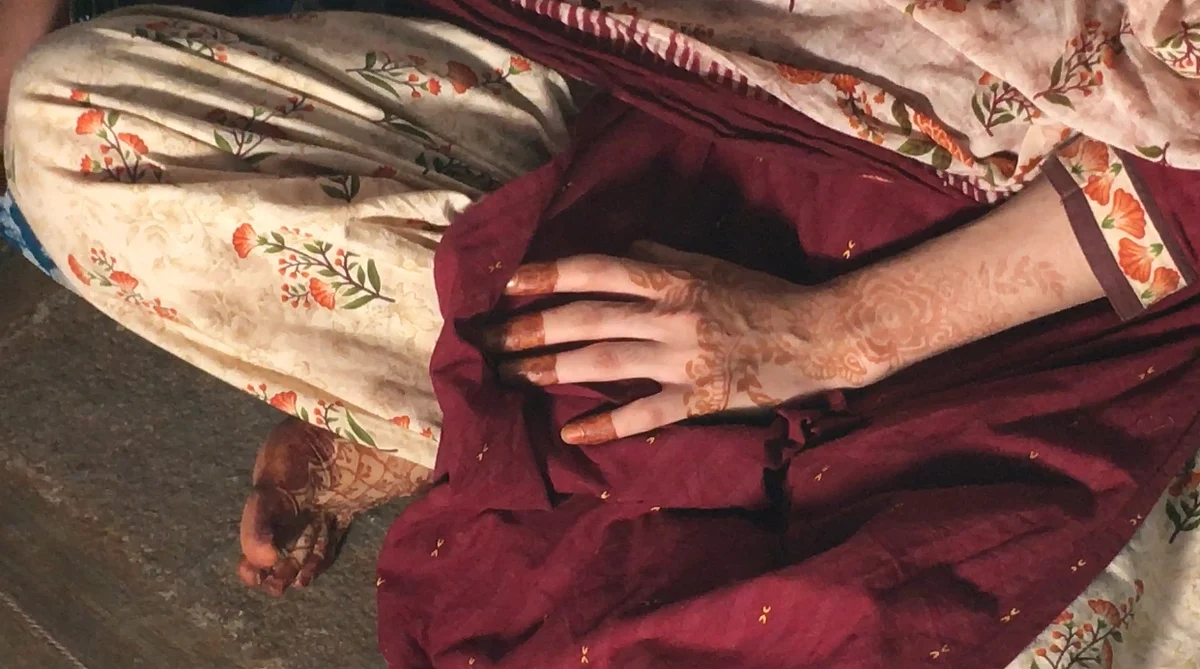 <div class="paragraphs"><p>Syed Ashrin Sultana still has last Eid's mehndi on her plams.</p></div>