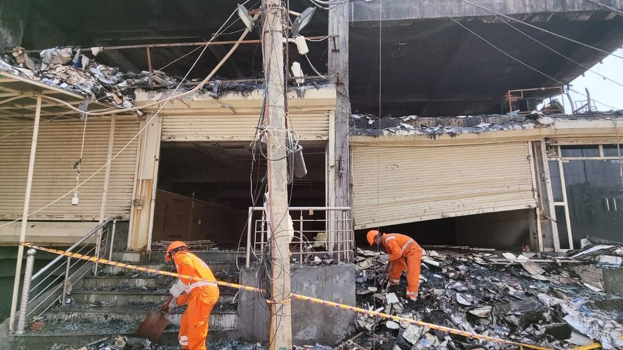 <div class="paragraphs"><p>Search operations underway at a building near Delhi's&nbsp;Mundka metro station where a fire broke out on Friday, 13 May.</p></div>