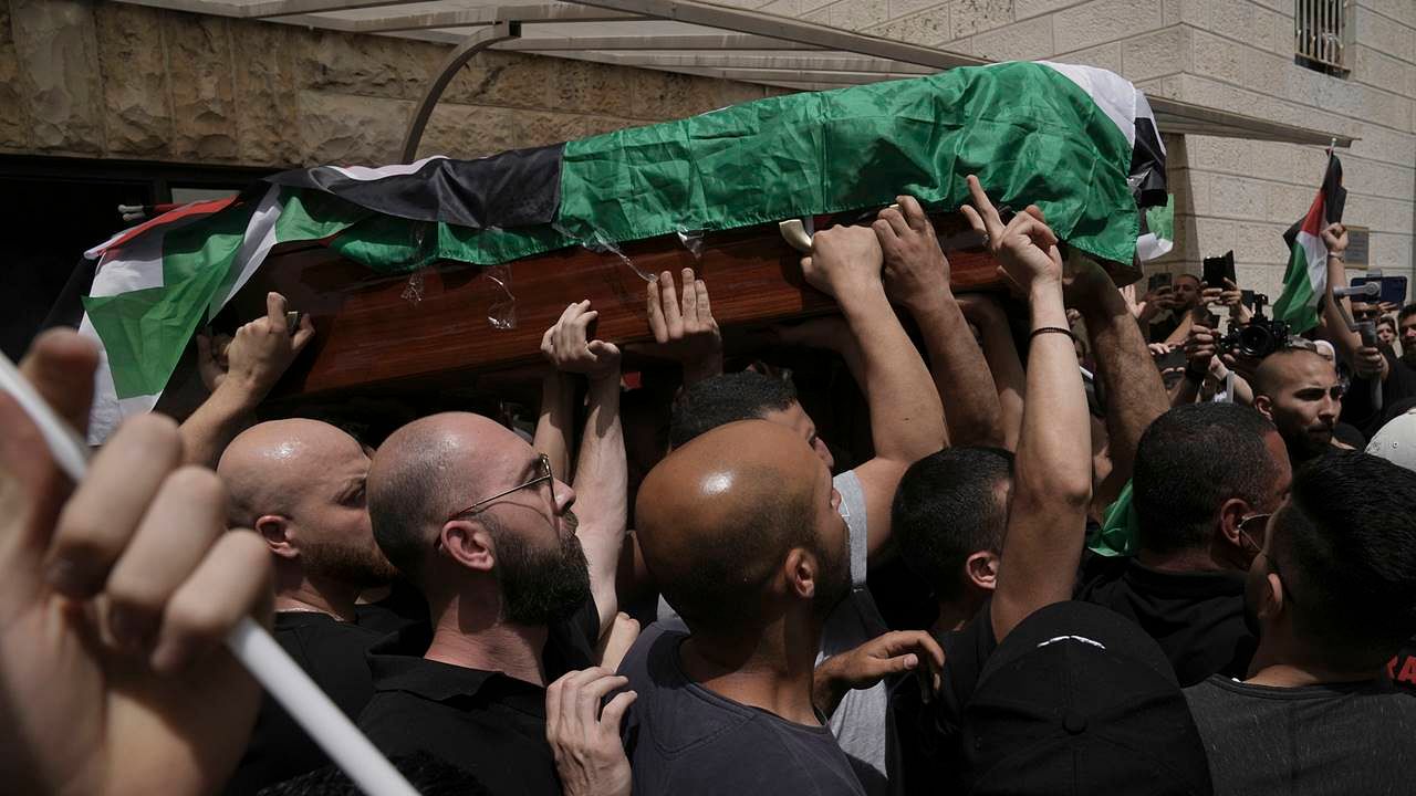 <div class="paragraphs"><p>Mourners carry the Palestinian flag-draped coffin of slain Al Jazeera veteran journalist Shireen Abu Akleh on the way to her final resting place, in east Jerusalem.</p></div>
