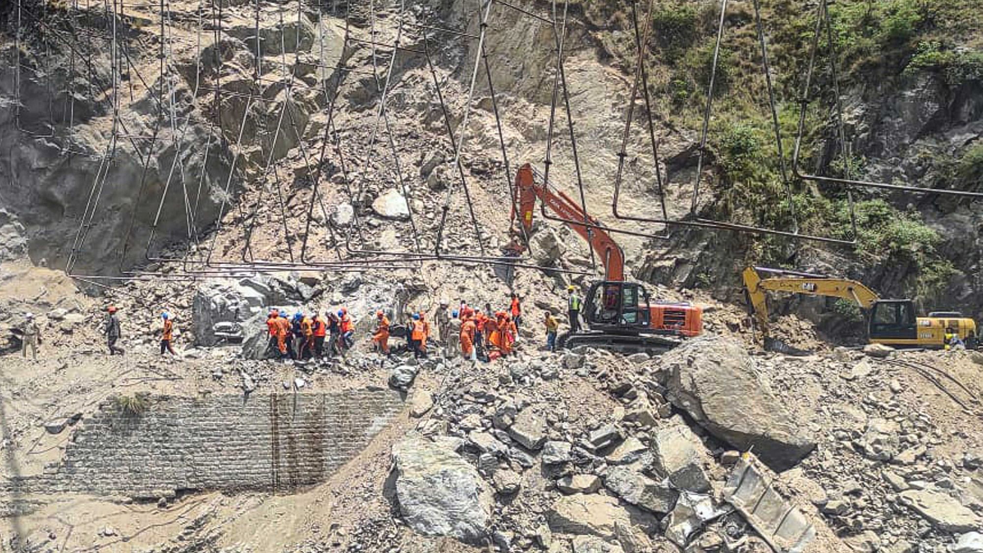 <div class="paragraphs"><p>Rescue operation underway  to save labourers trapped under debris following the collapse of an under-construction tunnel on the Jammu-Srinagar national highway, near Magarkote in Ramban district.</p></div>