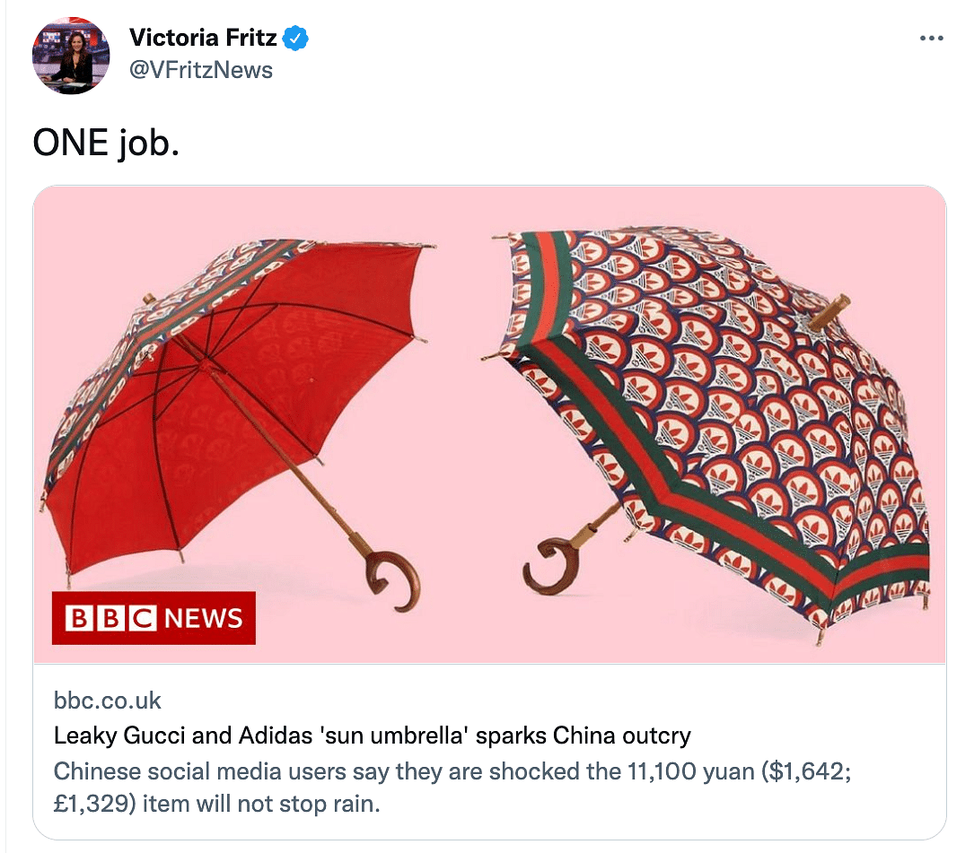 The umbrella is "decorative" and hence doesn't actually stop the rain. 