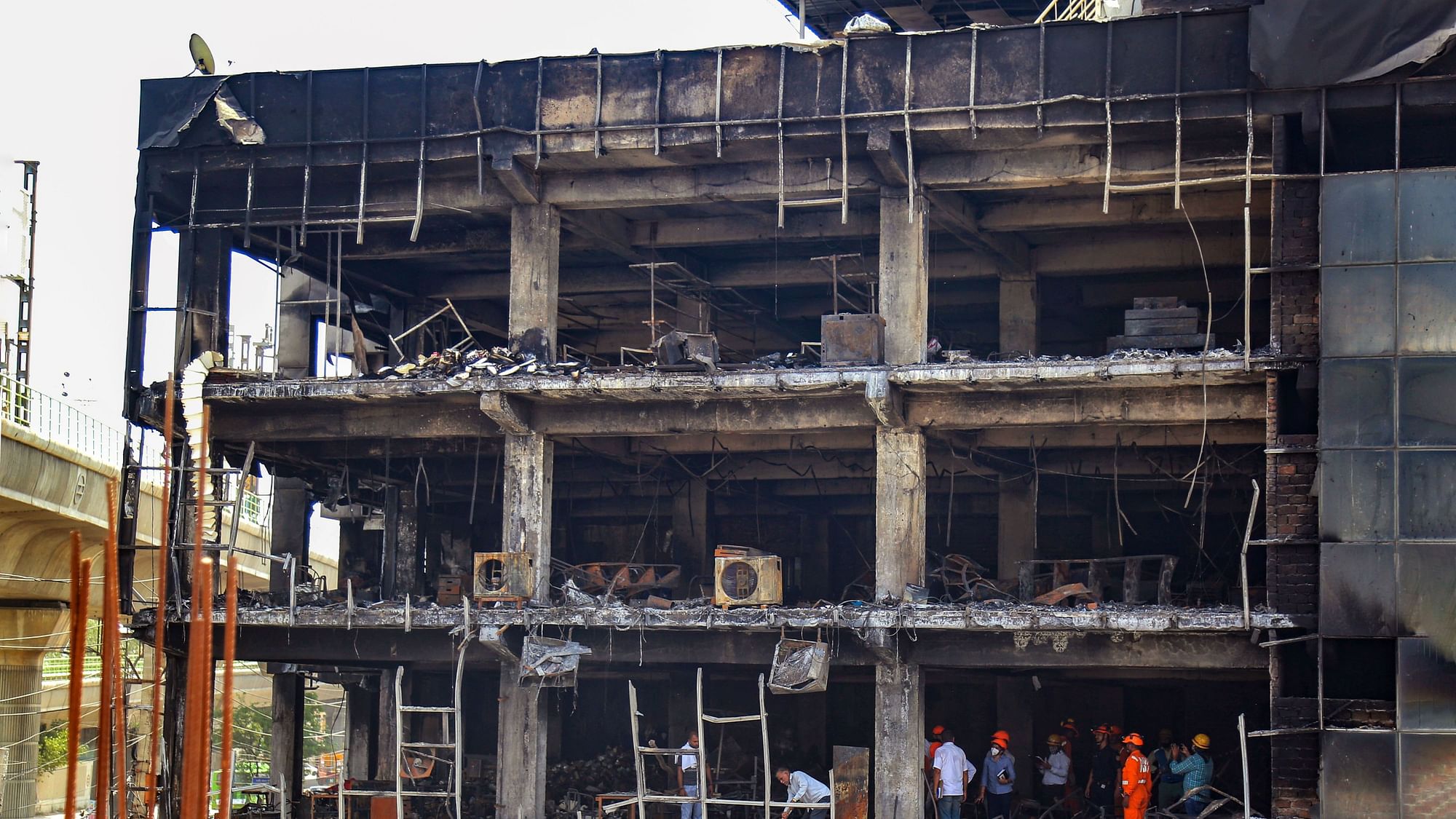 <div class="paragraphs"><p>Manish Lakra, the owner of the building in <a href="https://www.thequint.com/big-story/mundka-fire">Mundka that was gutted</a> in a massive fire on 13 May, along with the owners of a company in the same multistorey structure – Harish Goel and Varun Goel – were on Tuesday, 17 May, sent to one-day police custody by a city court, an official said.</p></div>