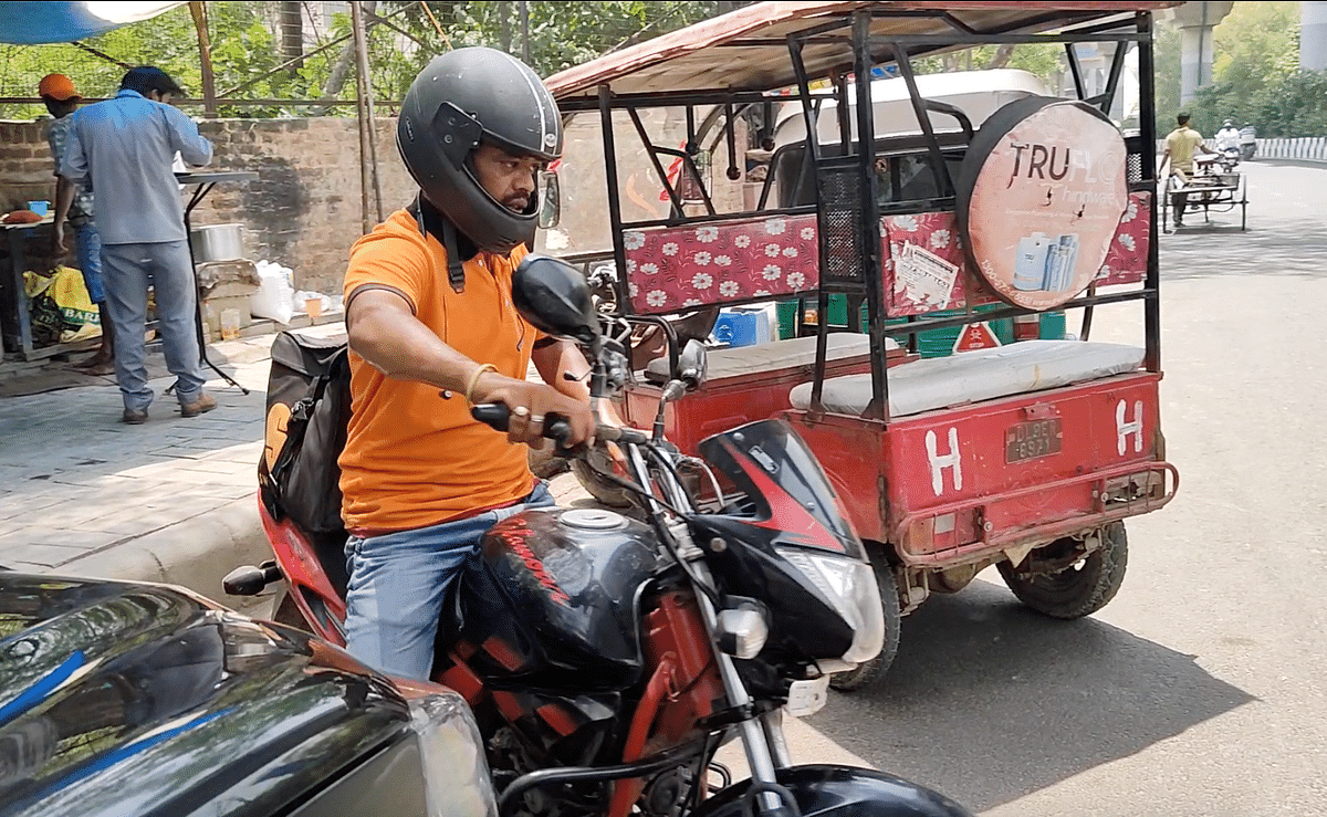 <div class="paragraphs"><p>Sanjay Singh, a food delivery executive, going to deliver his order.</p></div>