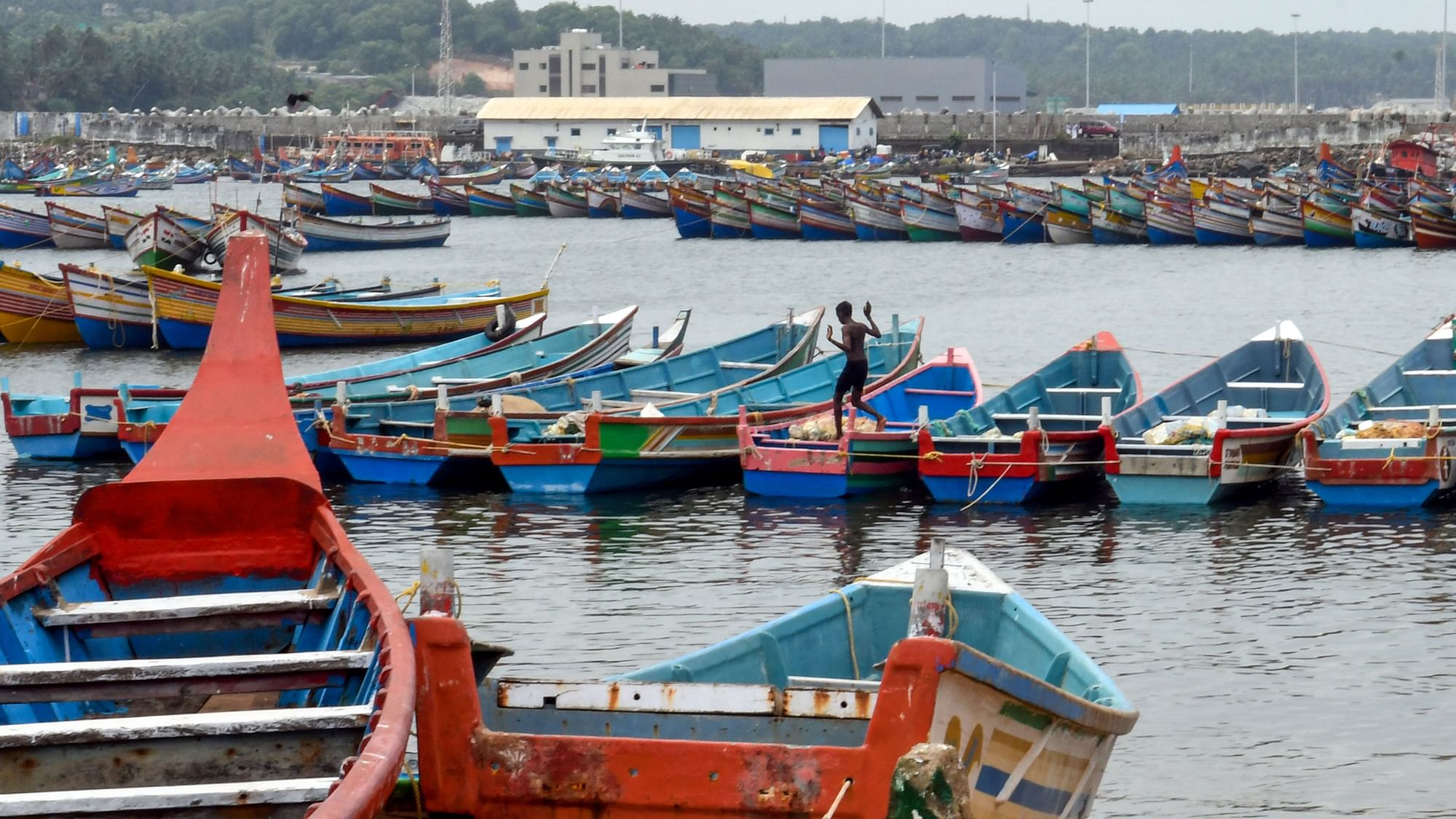 <div class="paragraphs"><p>Boats parked on the shore by fishermen as part of precautionary measures for Cyclone Asani, at Vizhinjam port in Thiruvananthapuram.</p></div>