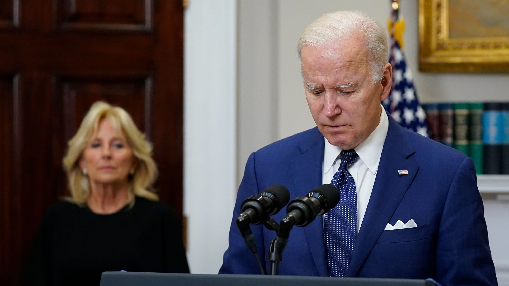 <div class="paragraphs"><p>President Joe Biden pauses as he speaks about the mass shooting at Robb Elementary School in Uvalde, Texas, from the Roosevelt Room at the White House, in Washington, Tuesday, 24 May, 2022, as first lady Jill Biden listens.</p></div>