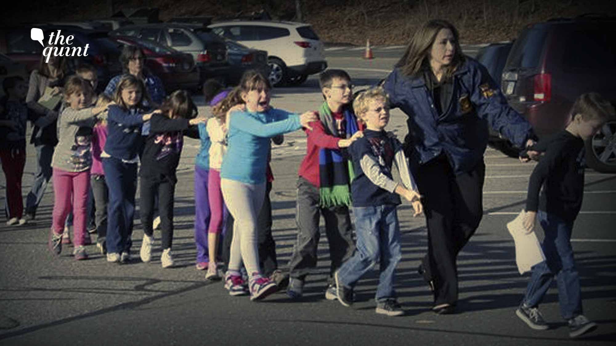 <div class="paragraphs"><p>A still from the Sandy Hook shooting.</p></div>