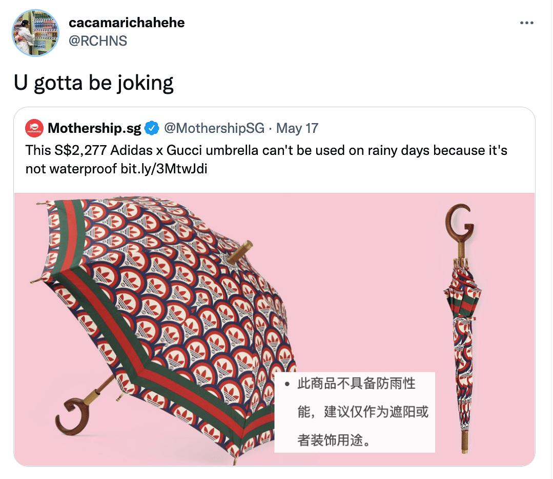 The umbrella is "decorative" and hence doesn't actually stop the rain. 