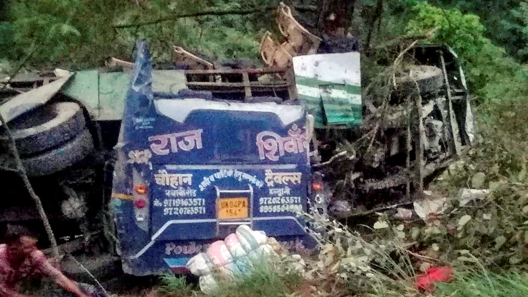 <div class="paragraphs"><p>Wreckage of a bus after it fell into a deep gorge, in Uttarkashi district, Sunday, 5 June, 2022. </p></div>