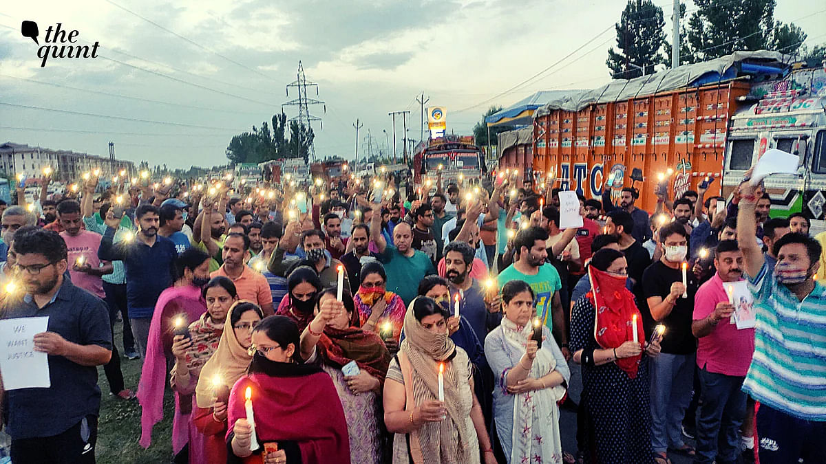<div class="paragraphs"><p>People undertaking a candle march protest against the killing of Kashmiri Pandits in the Valley.</p></div>