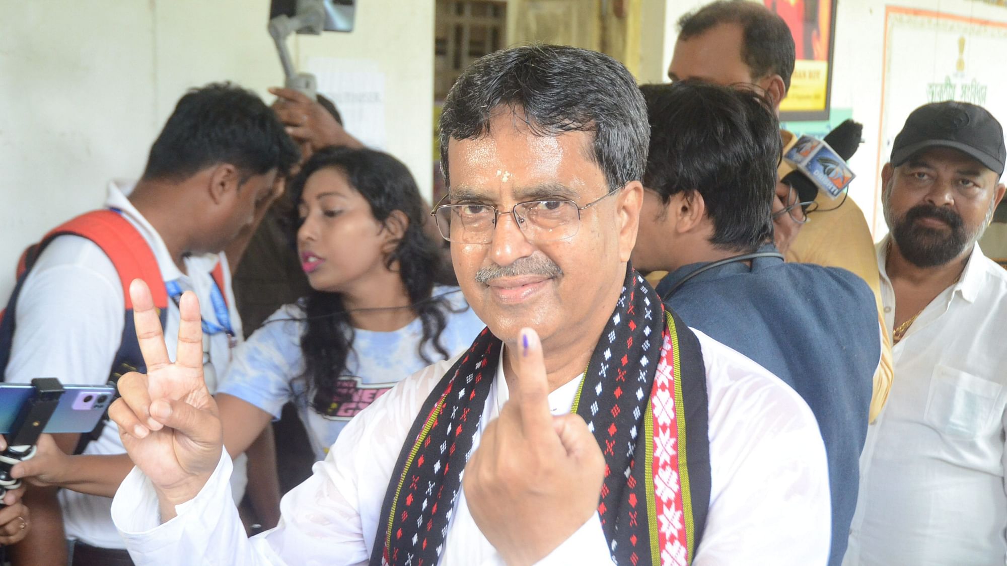 <div class="paragraphs"><p>Tripura Chief Minister Manik Saha poses for a photograph after casting his vote at a polling station.</p></div>