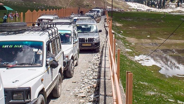 <div class="paragraphs"><p>Traffic jam at Saribal. The traffic jams have increased manifold in Kashmir due to tourist rush.</p></div>