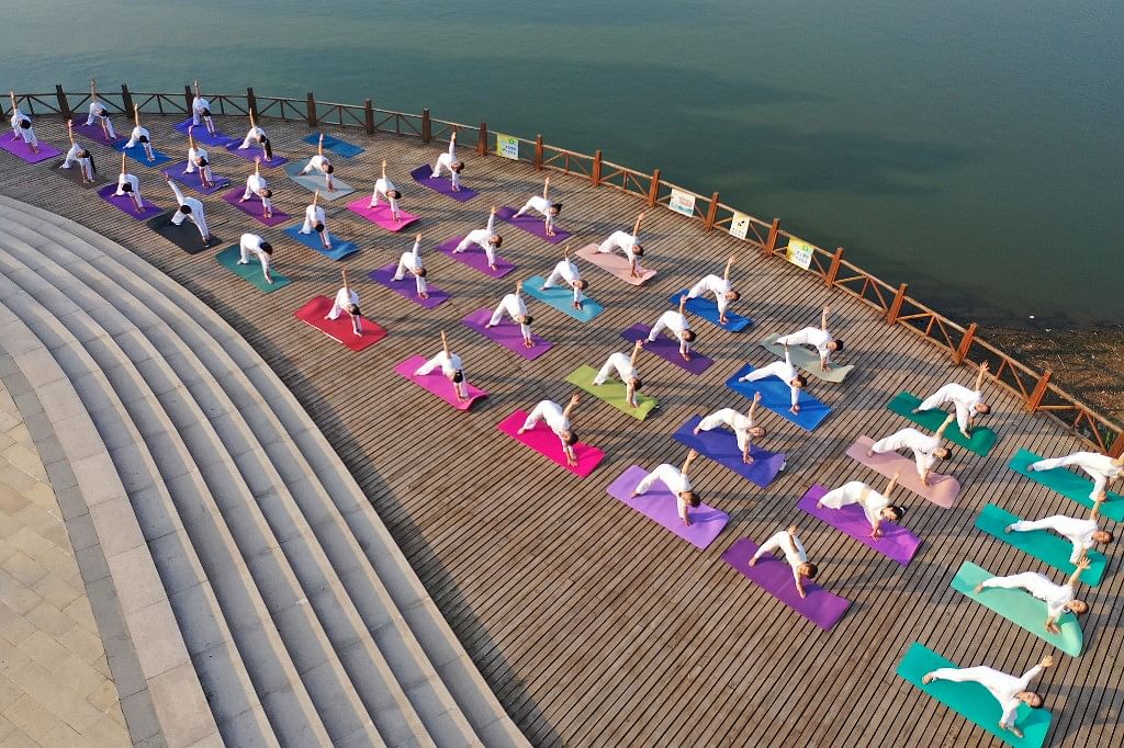 <div class="paragraphs"><p>People practicing Yoga in China.</p></div>