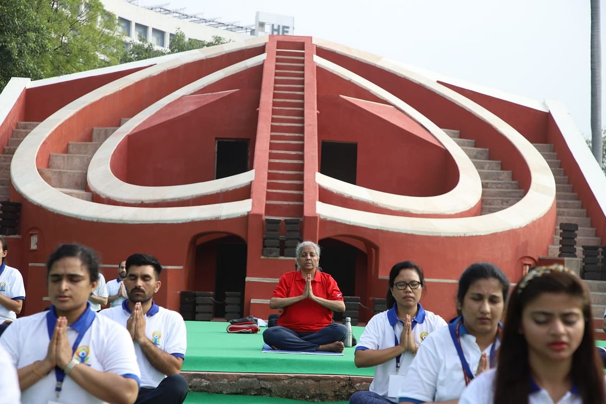 <div class="paragraphs"><p>Finance Minister Nirmala Sitharaman meditates at a Yoga event at Delhi's Jantar Mantar.</p></div>