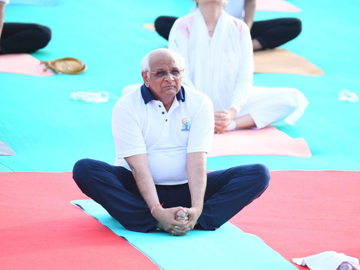 <div class="paragraphs"><p>Chief Minister of Gujarat Bhupendra Patel doing the butterfly pose.</p></div>