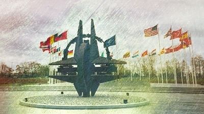 <div class="paragraphs"><p>Photo taken on 6 April, 2022 shows a sculpture and flags at NATO headquarters in Brussels, Belgium. </p></div>