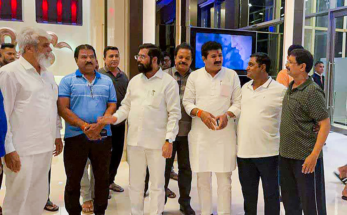 <div class="paragraphs"><p>Rebel Shiv Sena MLA Eknath Shinde with Minister of Agriculture of Maharashtra Dadaji Dagadu Bhuse and other rebel MLAs at a hotel, in Guwahati, Thursday, June 23, 2022</p></div>
