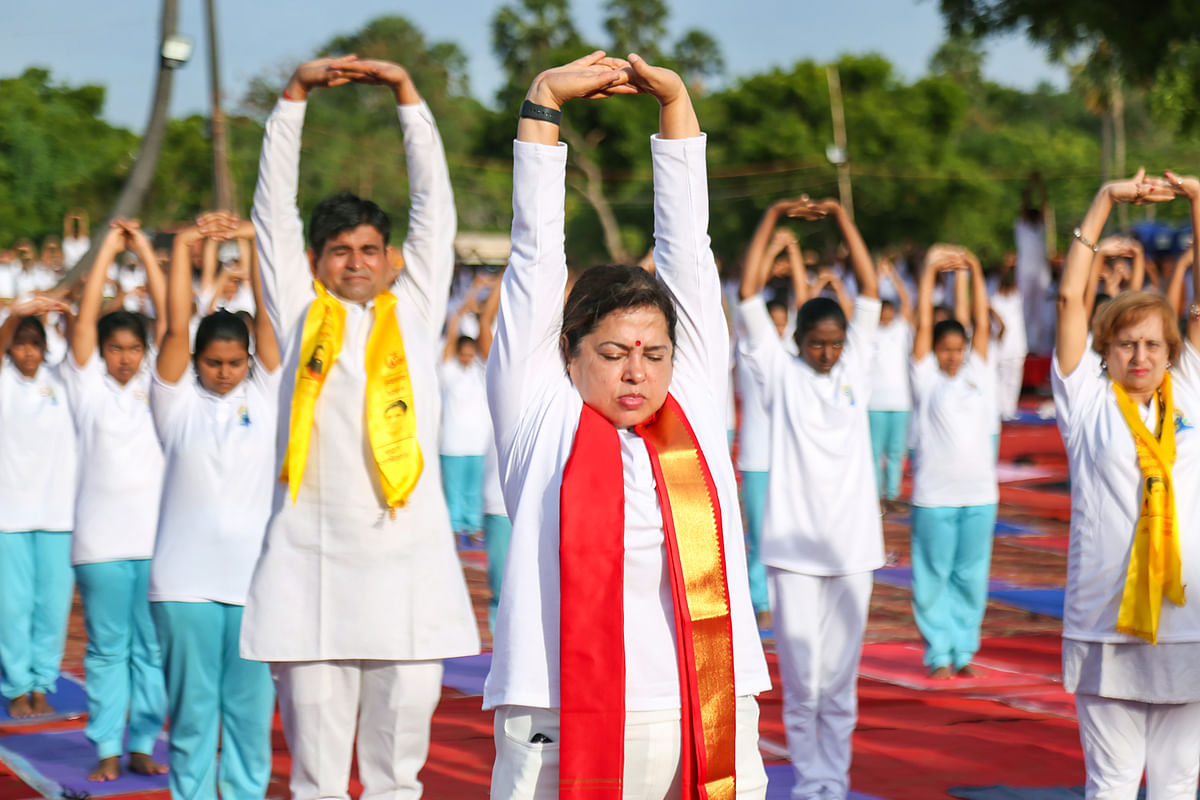 <div class="paragraphs"><p>Union Minister Meenakashi Lekhi performs yoga during a yoga session on the occasion of the 8th International Day of Yoga, at Vivekanand Kendra ground in Kanyakumari.</p></div>