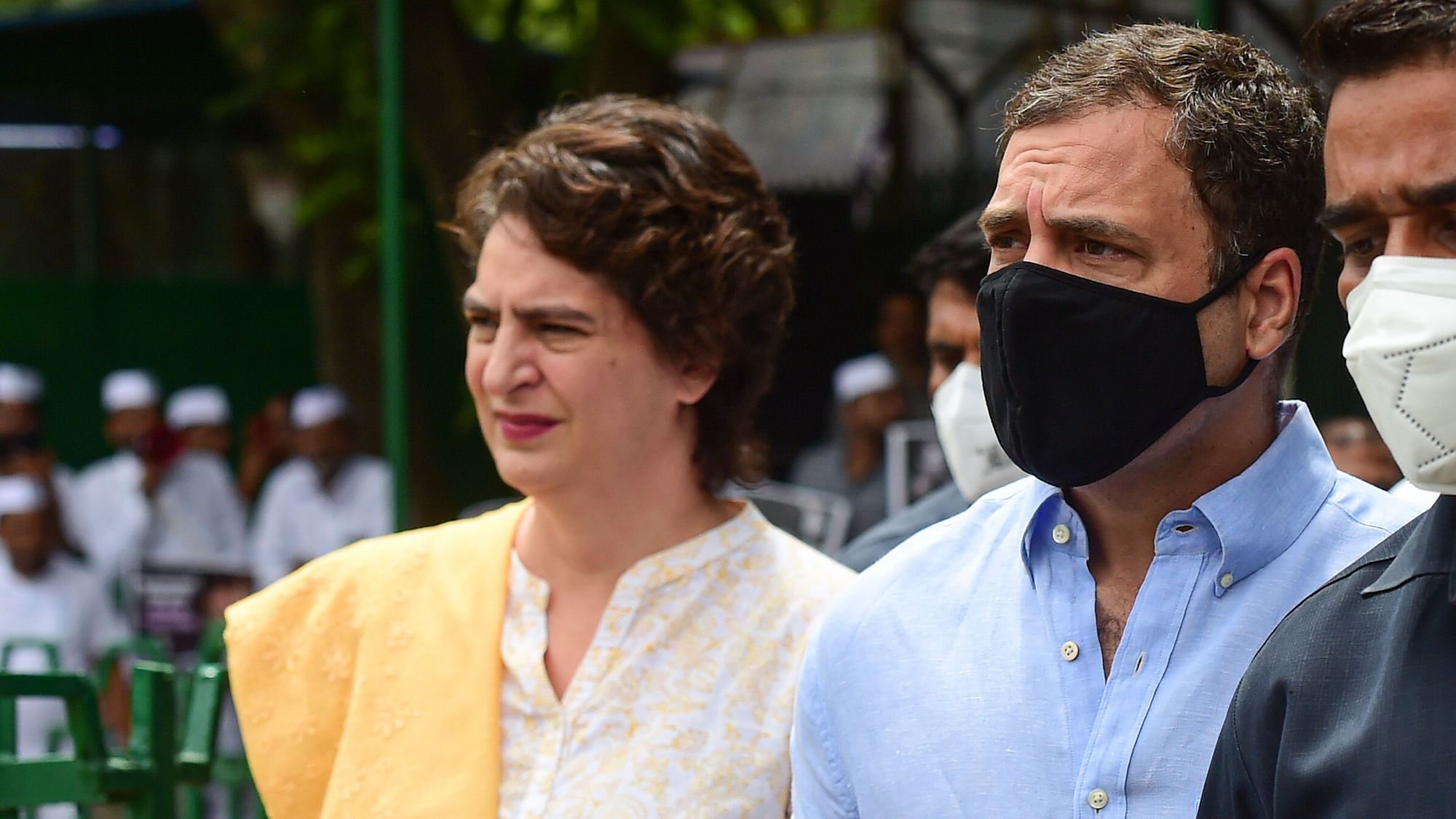 <div class="paragraphs"><p>New Delhi: Congress leaders Rahul Gandhi and Priyanka Gandhi outside AICC office, after the former was summoned for questioning in the National Herald case.</p></div>