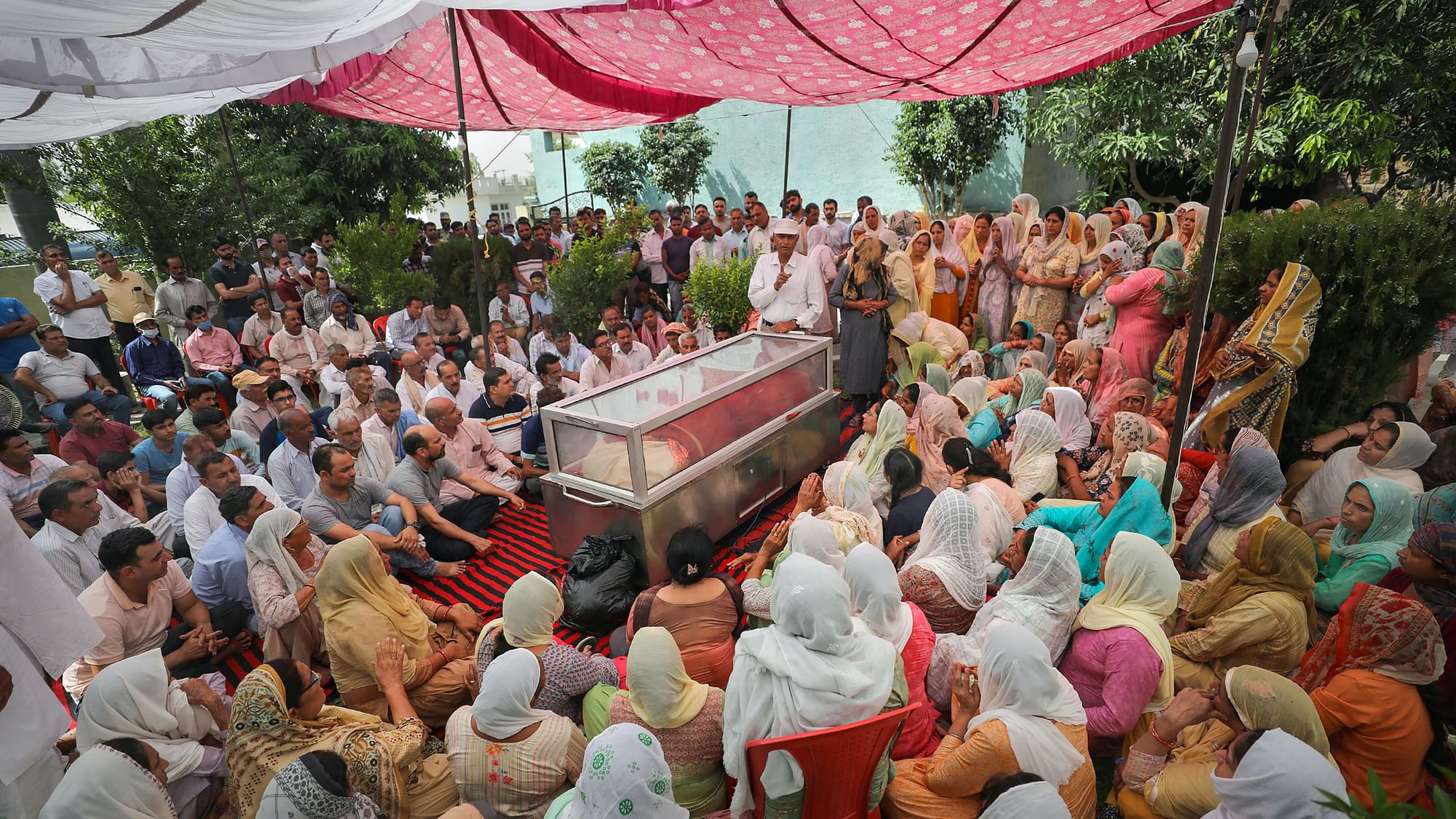 <div class="paragraphs"><p>Relatives and family members of government teacher Rajni Bala mourn during her funeral, in Samba on Wednesday.</p></div>
