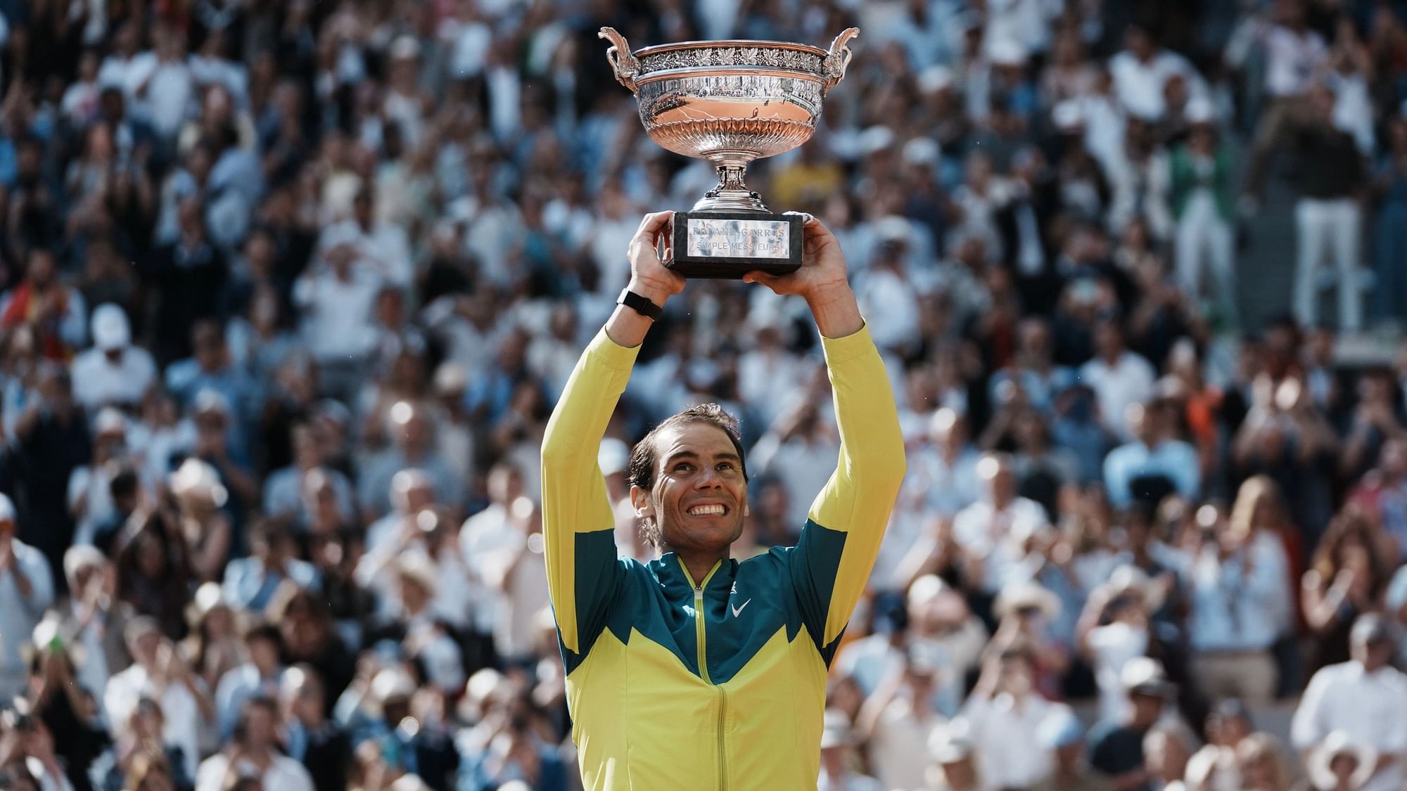 <div class="paragraphs"><p>Rafael Nadal with the French Open trophy</p></div>