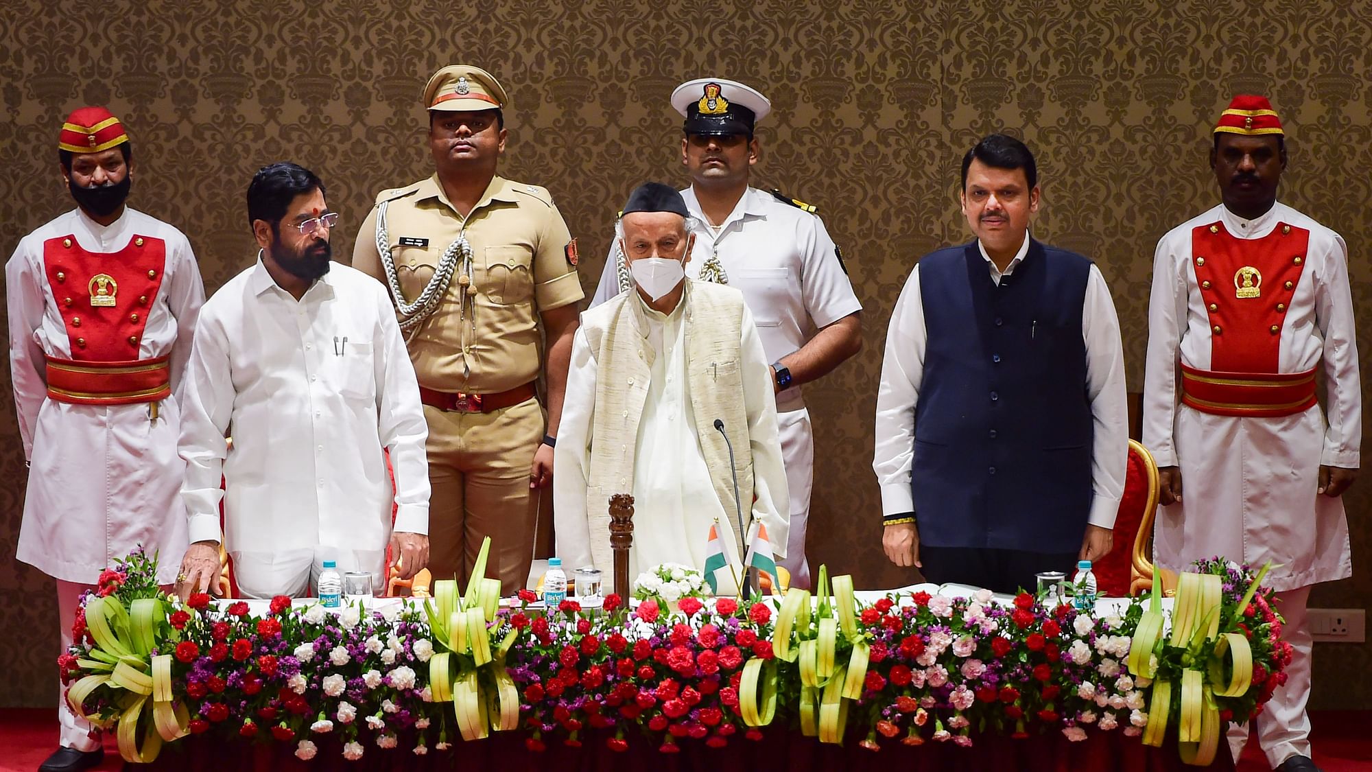 <div class="paragraphs"><p>Newly elected Maharashtra Chief Minister Eknath Shinde(L) and Deputy Chief Minister Devendra Fadnavis with Governor Bhagat Singh Koshyari(C) during their oath-taking ceremony, at Raj Bhavan in Mumbai, Thursday, 30 June.</p></div>