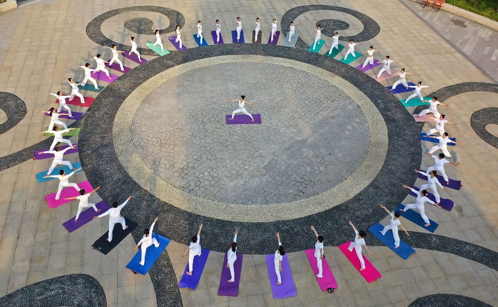 <div class="paragraphs"><p>People practicing Yoga in China.</p></div>