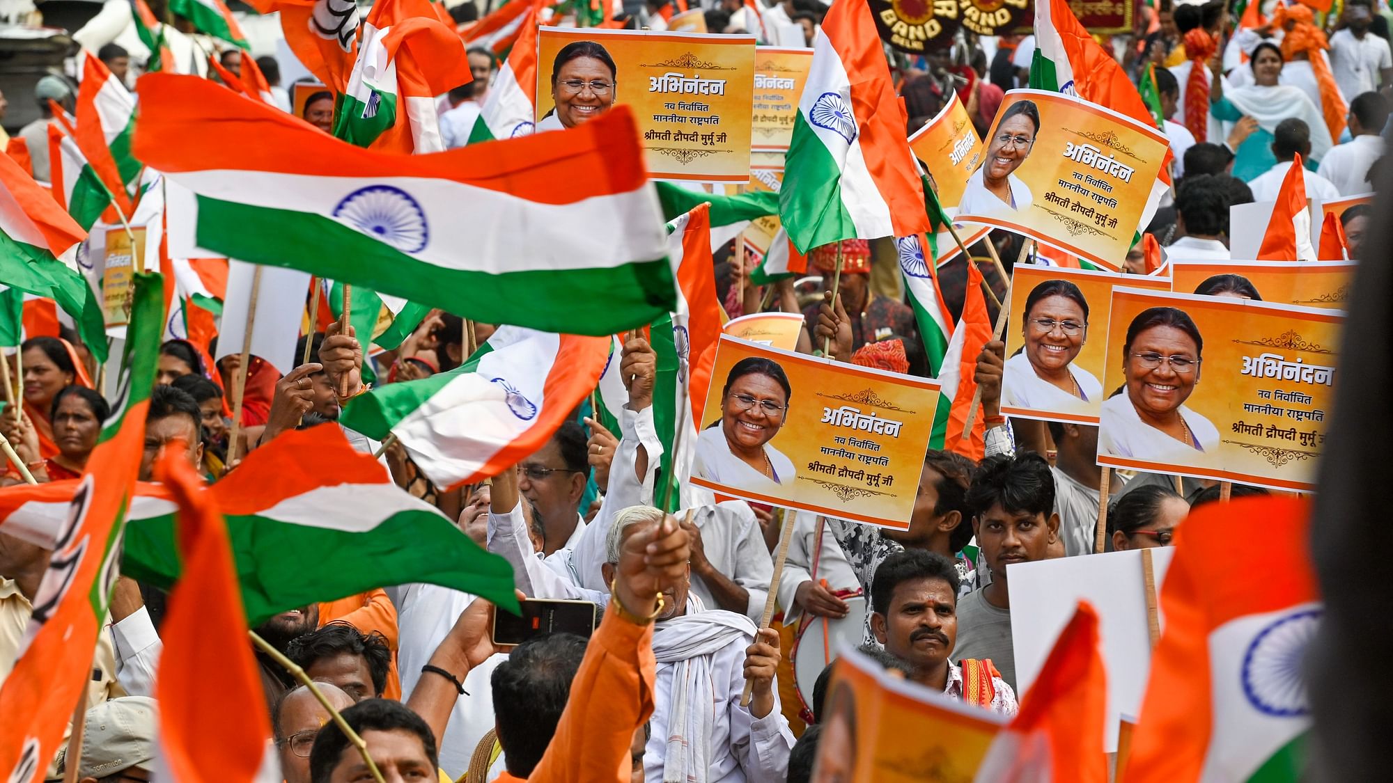 <div class="paragraphs"><p>BJP workers and supporters celebrate NDA's presidential candidate Droupadi Murmu's lead during the counting of votes to elect the 15th President of India, in New Delhi, Thursday, 21 July 2022.</p></div>