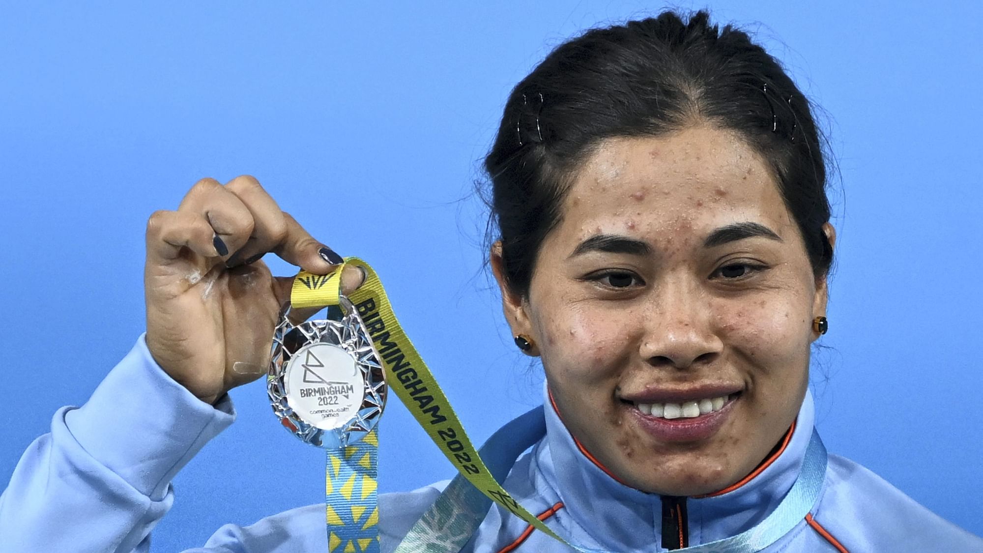 <div class="paragraphs"><p>India's Bindyarani Devi Sorokhaibam with the silver medal after competing in the women's 55kg weightlifting category match of the Commonwealth Games 2022 in Birmingham.</p></div>
