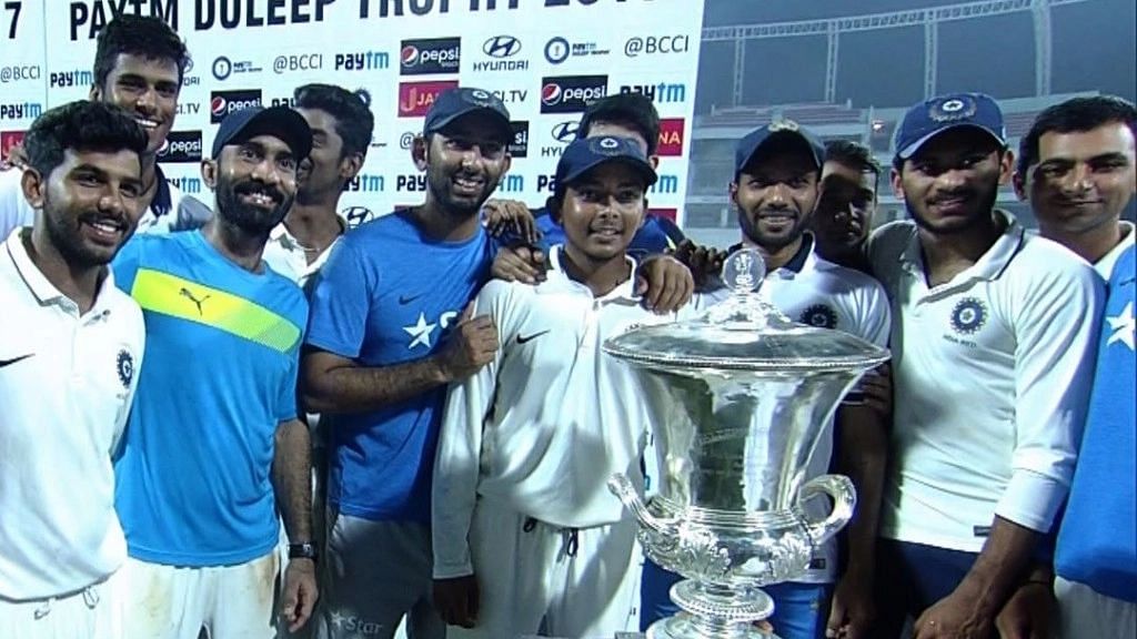 <div class="paragraphs"><p>The India Red team members pose after winning the 2019-20 Duleep Trophy.</p></div>