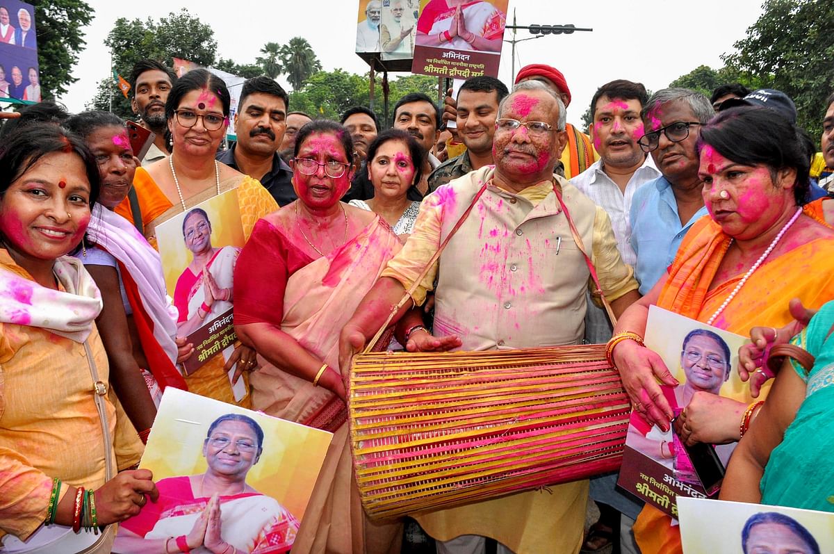 <div class="paragraphs"><p>Bihar Deputy CM Tarkishore Prasad celebrates NDAs presidential candidate Droupadi Murmus lead during counting of votes to elect the 15th President, in Patna.</p></div>