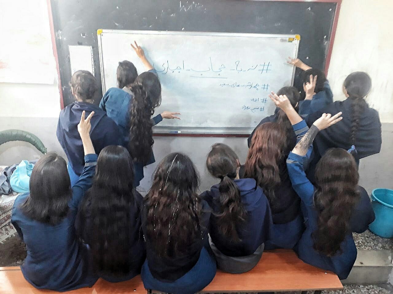 <div class="paragraphs"><p>Iranian girl students in a classroom without the hijab.</p></div>
