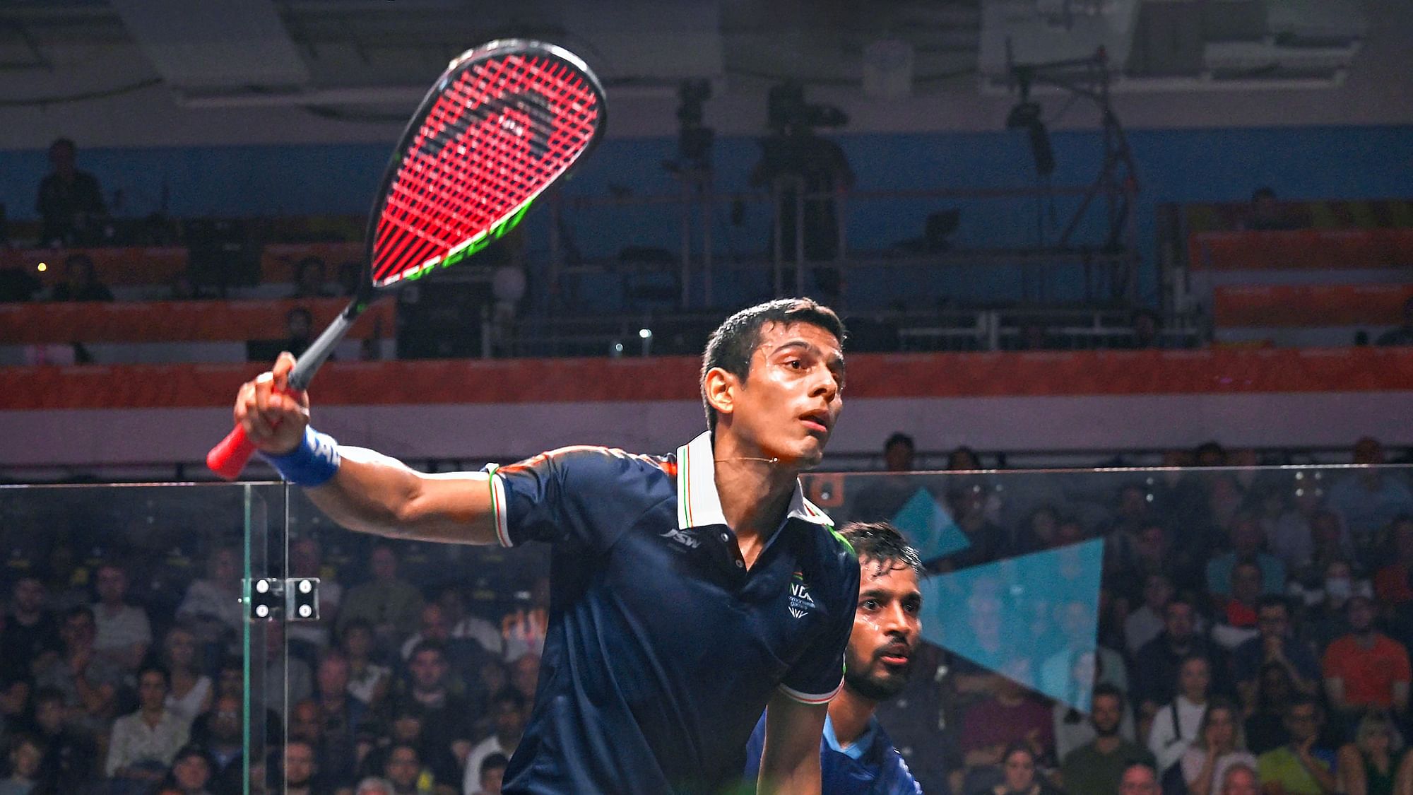 <div class="paragraphs"><p>India's Saurav Ghosal in action against Sri Lanka's Shamil Wakeel during squash men's singles Round of 32 match at the 2022 Commonwealth Games in Birmingham on Saturday.</p></div>