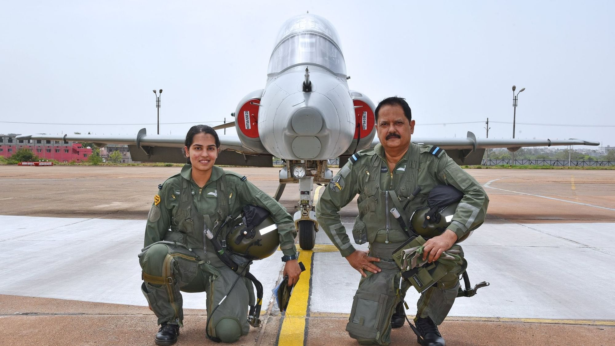 <div class="paragraphs"><p>Air Commodore Sanjay Sharma posing with his daughter,  Flying Officer Ananya Sharma, in front of an IAF jet in Karnataka's Bidar.</p></div>