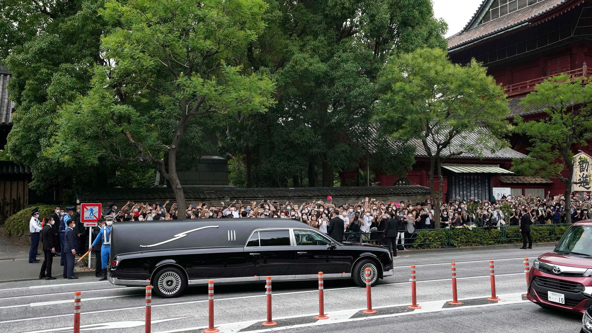 <div class="paragraphs"><p>The vehicle carrying the body of late former Japanese Prime Minister Shinzo Abe leaves Zojoji temple after his funeral in Tokyo.</p></div>