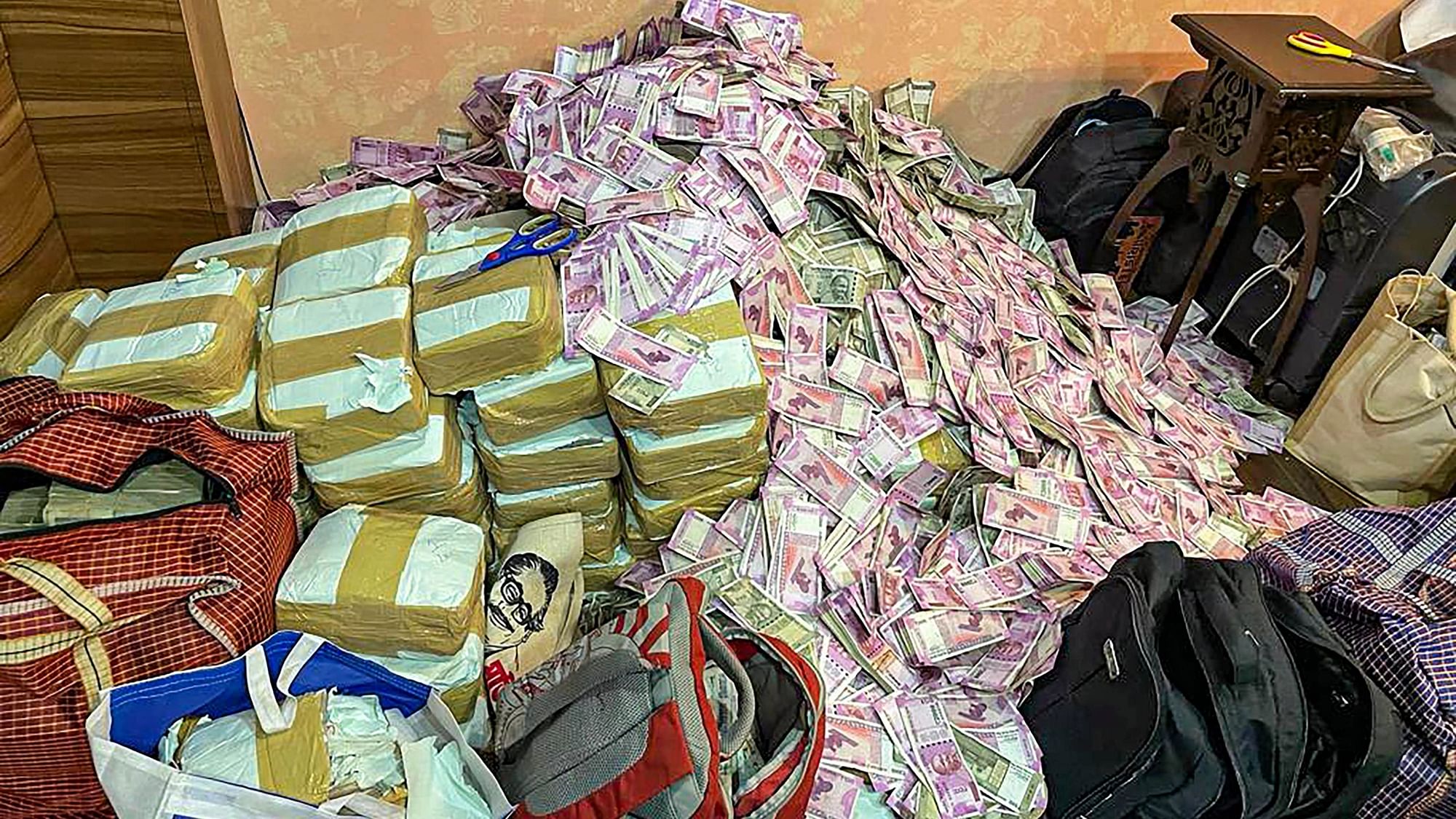 <div class="paragraphs"><p>Rs 20 crore in cash seized by ED from the premises of an aide of West Bengal minister Partha Chatterjee after the agency conducted raids on Friday, 22 July.</p></div>