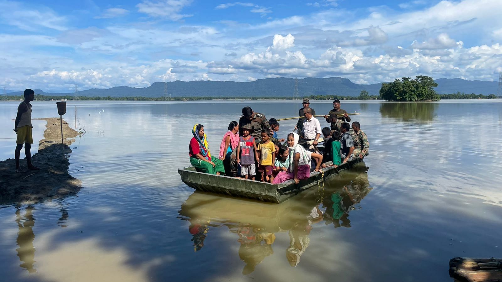 <div class="paragraphs"><p>Troops of Assam Rifles and SpearCorps Engineers rescued 53 individuals, including a cancer patient, in ongoing flood relief operations in Silchar, Assam on 2 Jul 2022.</p></div>
