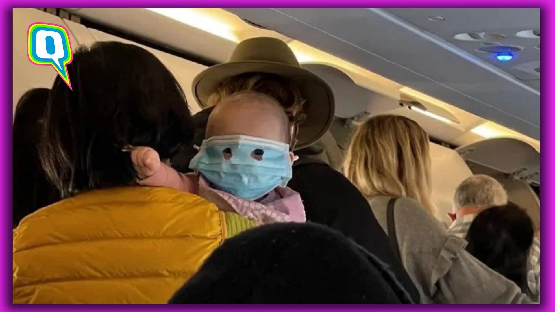 <div class="paragraphs"><p>Baby wearing an adult face mask on the flight has sparked an online debate.</p></div>