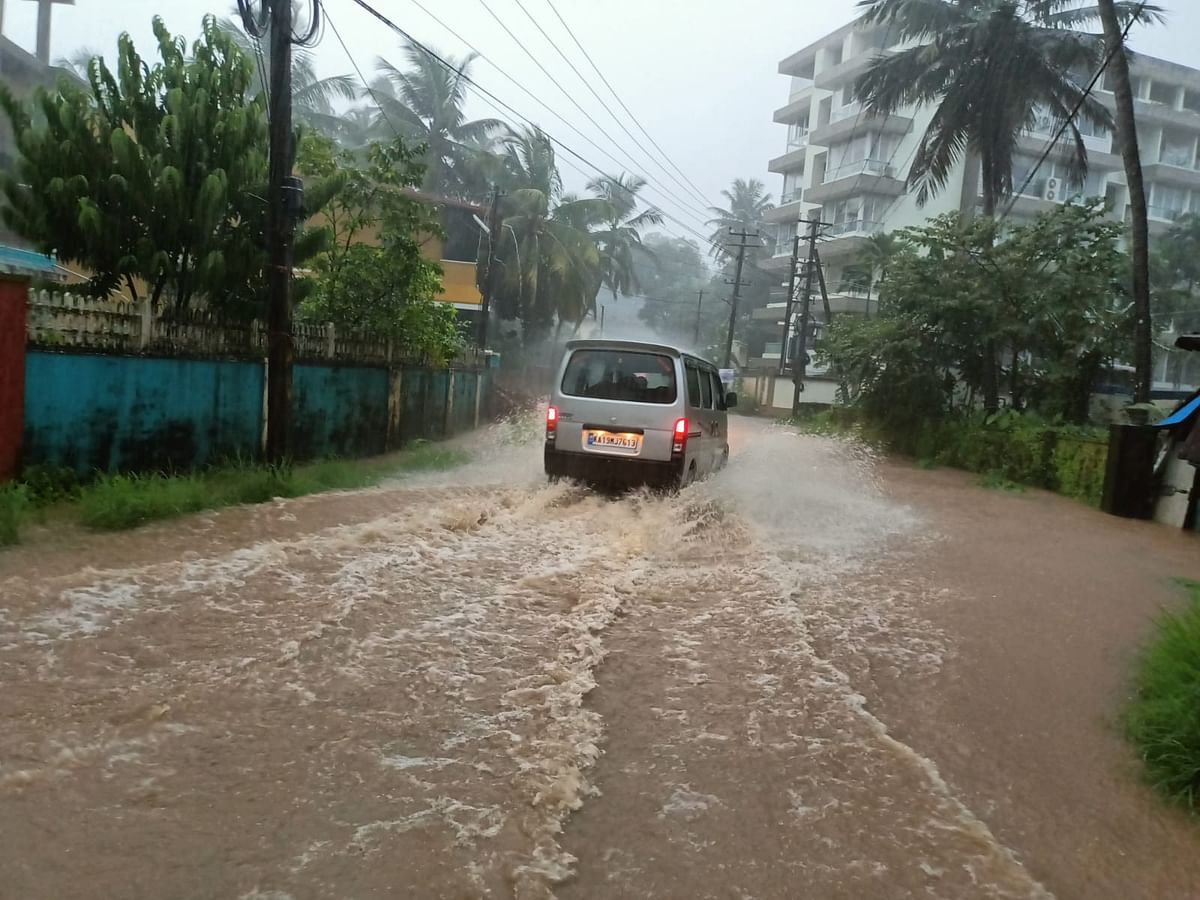 Visuals show roads inundated with rainwater in the Dakshina Kannada district after experiencing flash floods. 