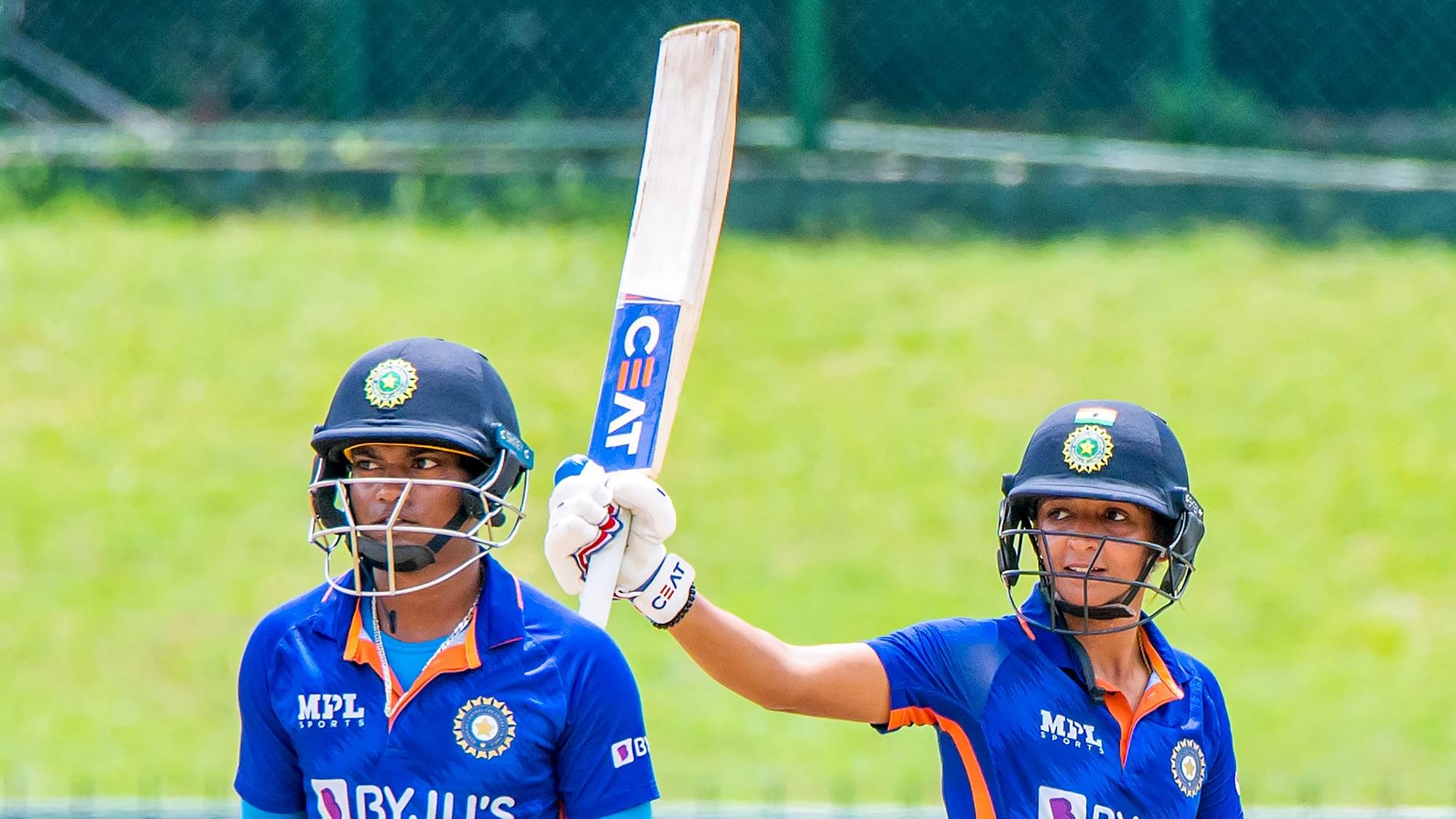 <div class="paragraphs"><p>Indian skipper Harmanpreet Kaur (right) celebrates after scoring fifty runs during the third ODI cricket match&nbsp;against  Sri Lanka at Pallekele on Thursday.</p></div>